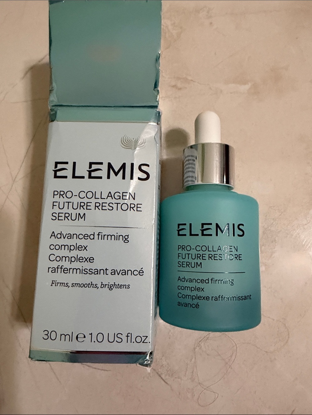 ELEMIS Turquoise Aqua Pro-Collagen Future Restore Serum Bottle